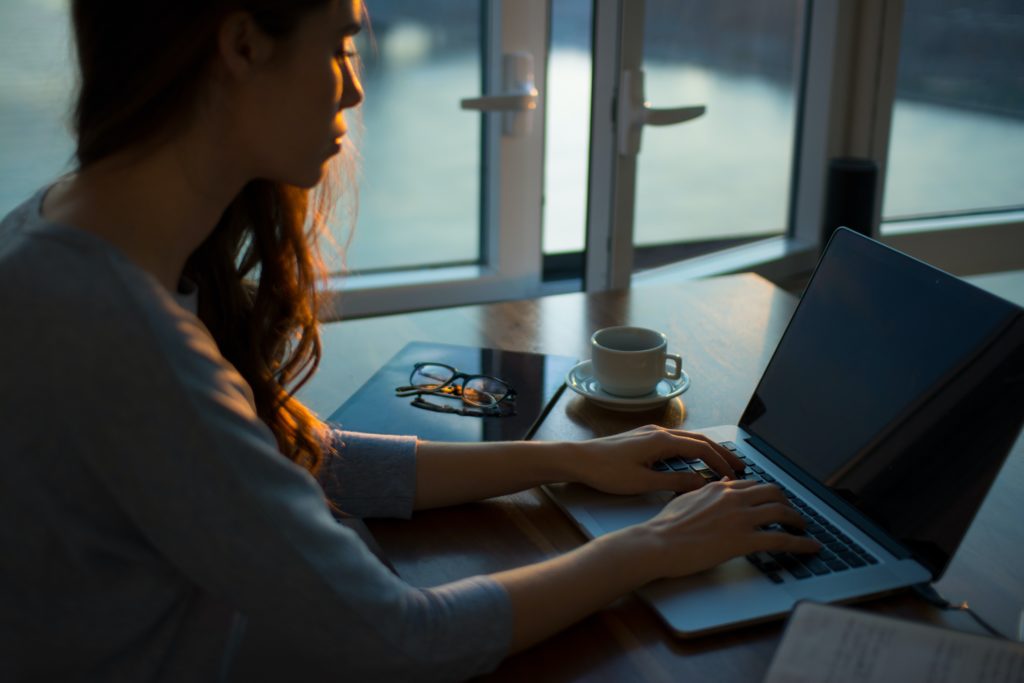 Woman working on the computer at her desk