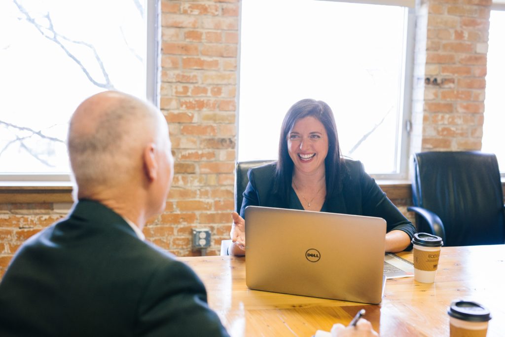 Woman and man sitting down for an interview